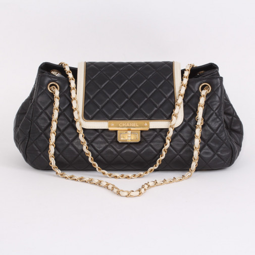 Shoulder bag black quilted leather and white border leather