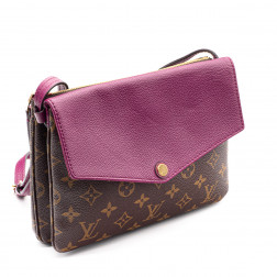 Sac Pochette Twice en Toile Monogram et cuir rose foncé