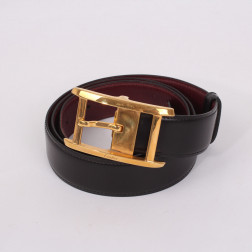 Belt buckle and two leathers including one crocodile skin T.92