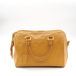 Speedy 25 shoulder bag in leather Monogram Empreinte Safran Impérial