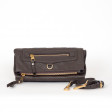 Clutch Pétillante Cuir Empreinte Terre and its shoulder strap